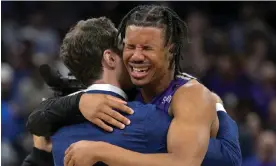  ?? Photograph: Phelan M Ebenhack/AP ?? Furman guard Mike Bothwell, right, gets emotional after the Paladins’ shock win over Virginia on Thursday in the NCAA tournament.