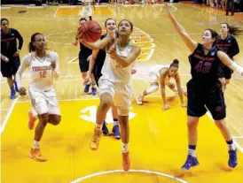  ?? ASSOCIATED PRESS FILE PHOTO ?? Tennessee’s Jaime Nared (31) shoots ahead of Boise State’s Kayla Reinhart (42) in a game in Knoxville. The Lady Vols are hot going into the SEC tournament.