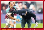  ??  ?? GET OFF Noble confronts a pitch invader