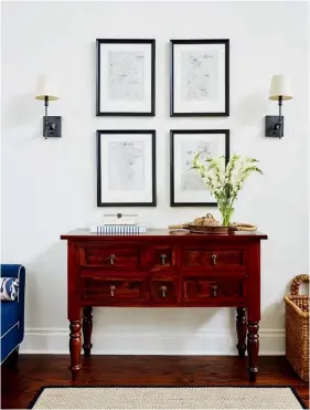  ??  ?? FAR LEFT Above the console in the great room, the designer framed and hung a simple grid of antique Simcoe County maps. Believe it or not, the stunning console was a Craigslist purchase. “I love finding preloved pieces online, at markets and at...