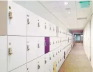  ?? Jason Janik, Dallas Morning News ?? Lockers line the hallways at the campus.