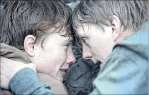  ?? ERIK AAVATSMARK/NETFLIX VIA AP ?? This image released by Netflix shows Isak Bakli Aglen, left, and Jonas Strand Gravli in a scene from “22 July,” a docudrama about the 2011 Norway terrorist attack.