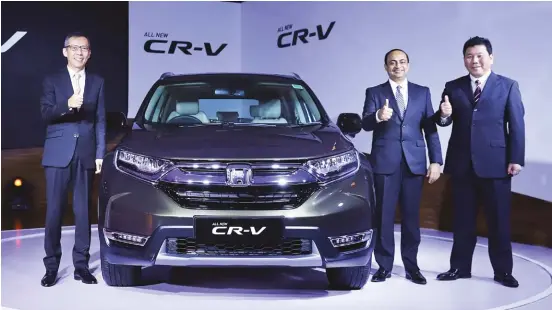  ??  ?? (L-R) Gaku Nakanishi, president, Honda Cars India flanked by Rajesh Goel, senior VP, sales and Hiromichi Tsushima, project leader