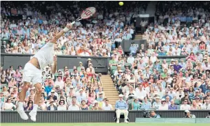  ?? TONY O'BRIEN/ACTION IMAGES ?? Seeing Roger Federer up close makes you truly appreciate his trademark precision — an ability to place the ball anywhere on the court, Ed Sherman writes.