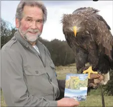  ??  ?? Pictured at the launch of the South and West Sligo brochure were tourism network member Lothar Muschketat and his eagle named Linda from Eagles Flying in Ballymote.