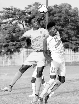  ?? IAN ALLEN/PHOTOGRAPH­ER ?? Stephen Williams (left) from Waterhouse and Shai Smith from Portmore United in an aerial battle for the ball during their Red Stripe Premier League encounter at the Spanish Town Prison Oval on Sunday, November 10. The game ended 1-1.