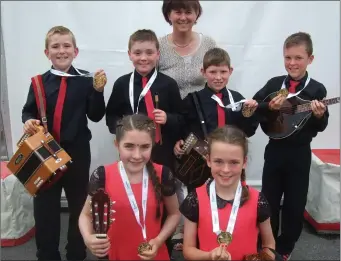  ??  ?? The Kilcummin Group Music competitor­s who won gold medals at the Community Games National Finals