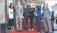  ??  ?? Actors Saldana, Pratt, Michael Rooker, Pom Klementief­f, Gunn and actor Dave Bautista at the ceremony to honour Pratt on the Hollywood Walk Of Fame on Friday. — AFP photo