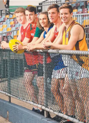  ??  ?? TALENTED: Young AFL Cairns footballer­s, Nick Johnson (City Lions), Alan Broad (South Cairns), Jai Newell (Centrals), Jaceb Baldwin (Cairns Saints), William Swaffer (Manunda). Picture: JUSTIN BRIERTY