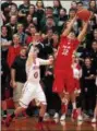  ?? RANDY MEYERS -- THE MORNING JOURNAL ?? Bradley Soltis of Firelands reaches for a rebound over Owen Morrison of Fairview during the third quarter.