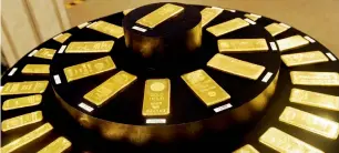  ?? — AFP ?? Gold for immediate delivery rose 8.9 per cent in 2016 to $1,155.12 an ounce, halting a three-year slide.