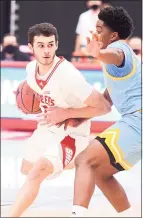  ?? Sacred Heart Athletics / SM Photograph­y ?? Sacred Heart Univerity men's basketball player Mike Sixsmith was named to the NEC All-Rookie team on Friday. Sixsmith is one of the best 3-point shooters in the conference, connecting on 54% from beyond the arc.