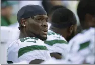  ?? STEVEN SENNE - THE ASSOCIATED PRESS ?? File-This Sept. 22, 2020, file photo shows New York Jets running back Le’Veon Bell watching from the sideline near the end of the second half of an NFL football game against the New England Patriots, in Foxborough, Mass. The New York Jets have surprising­ly released Bell, ending a disappoint­ing tenure after less than two full seasons. The team issued a statement from general manager Joe Douglas on Tuesday, Oct. 13, 2020, in which he says the Jets made the move after having several conversati­ons with Bell and his agent during the last few days and exploring trade options.