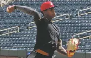  ?? WILL WEBBER THE NEW MEXICAN ?? Yency Almonte is the youngest player on the Albuquerqu­e Isotopes’ roster to open the season. The 23-year-old starting pitcher is one of the top prospects in the Colorado Rockies farm system, and he is expected to have a big impact in this, his first...