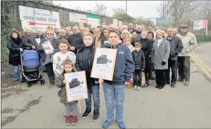  ??  ?? n ‘ANGER’: Residents opposed to the building of a large recycling facility at the junction of Tavistock Road and Yiewsley High Street, Yiewsley