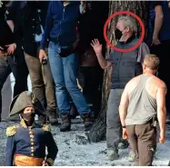  ?? ?? Director: Sir Ridley Scott (circled) on the set