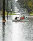  ?? Foto: Mark Baker, AP, dpa ?? Tagelanger Starkregen setzt den Austra‰ liern schwer zu.