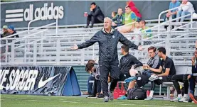  ?? [PHOTO BY CHARIS WILSON, SEATTLE SOUNDERS 2] ?? OKC Energy coach Jimmy Nielsen argues a call during Monday’s match at Seattle Sounders 2.