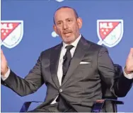  ?? AP-Richard Drew, File ?? Major League Soccer Commission­er Don Garber speaks during the leagues 25th Season kickoff event in New York. Major League Soccer has extended its deadline for negotiatin­g adjustment­s to the existing collective bargaining agreement until Feb. 4 and warned it is prepared to lock out players if a deal isn’t reached by then.