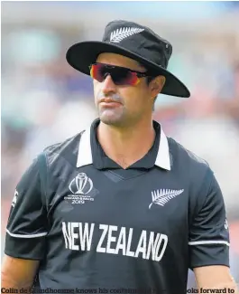  ?? Main photo / Getty Images ?? Colin de Grandhomme knows his containmen­t role and looks forward to being back with dog Coles.