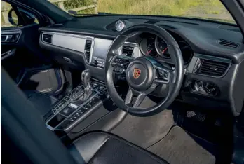  ??  ?? Below Effortless­ly comfortabl­e cabin boasts some of the best seats Porsche has ever produced