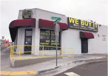  ?? ELISE KAPLAN/JOURNAL ?? We Buy It, on Central near Louisiana, was empty Tuesday after the owner and two employees were arrested on suspicion that they were buying and selling stolen goods.