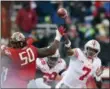  ?? NICK WASS — ASSOCIATED PRESS ?? Ohio State quarterbac­k Dwayne Haskins Jr. passes under pressure from Maryland linebacker Mbi Tanyi on Nov. 17 in College Park, Md.