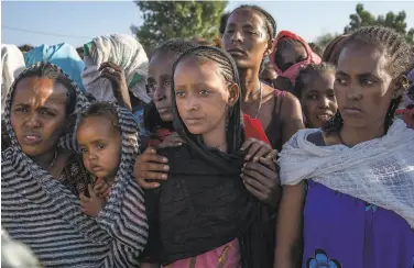  ?? Nariman El- Mofty / Associated Press ?? Tigray women are among the more than 40,000 refugees who have fled to Sudan to avoid the fighting.