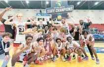  ?? SAGEMONT ATHLETICS ?? The Sagemont boys basketball team celebrates winning their second straight Class 2A state championsh­ip following a 50-47 win over Orlando Christian Prep at the RP Funding Center in Lakeland on Thursday night.