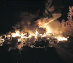  ?? ONTARIO PROVINCIAL POLICE-SERGEANT KERRY SCHMIDT / THE CANADIAN PRESS ?? Three people died in this fiery 14-vehicle pileup on Hwy. 400, north of Toronto on Tuesday.