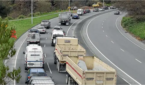  ?? ANTHONY PHELPS/STUFF ?? Traffic backed up heading into town from an overbridge on Gracefield St as a result of road closures due to flood damage in Nelson.