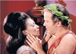  ??  ?? Star Trek’s biracial kiss between Nyota Uhura and James T. Kirk “suggested there was a future where (racial issues) were not such a big deal,” says television critic Eric Deggins.