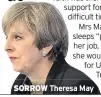  ??  ?? SORROW Theresa May