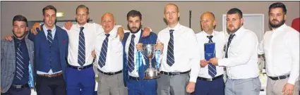  ??  ?? Faversham Strike Force receive their trophy from Alex Rafferty, of sponsors NRG