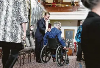  ?? Bob Daemmrich / Capitol Press photo ?? Texas House Speaker Dade Phelan greets Gov. Greg Abbott during opening ceremonies of the 87th Legislatur­e last month. On Thursday, Phelan announced his picks for committee chairs.