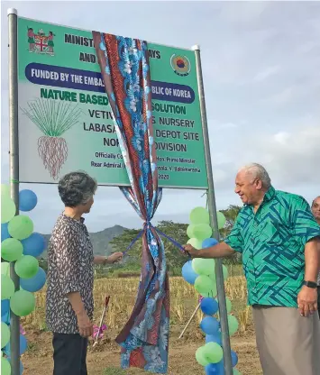  ?? Photo: Laisa Lui ?? Prime Minister Voreqe Bainimaram­a commission­s the new Vetiver Nursery in Labasa on July 2,2020.