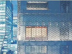  ?? HOSHINOYA VIA THE NEW YORK TIMES ?? Patterned metal lattice veiling the Hoshinoya Tokyo, a contempora­ry ryokan reimagined in a city tower, in a photo provided by the hotel.