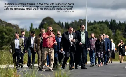  ?? DAVID UNWIN/STUFF ?? Rangitāne kaumatua Wiremu Te Awe Awe, with Palmerston North mayor Grant Smith and council property manager Bryce Hosking, leads the blessing of stage one of the Tamakuku Terrace project.