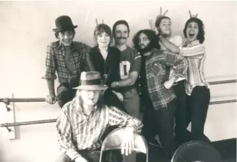  ?? | MICHAEL GOLD/MAGNOLIA PICTURES ?? In the 1970s heyday of the National Lampoon, future stars Chevy Chase (right) and John Belushi (third from right) cavort with castmates in a photo seen in “Drunk Stoned Brilliant Dead.”