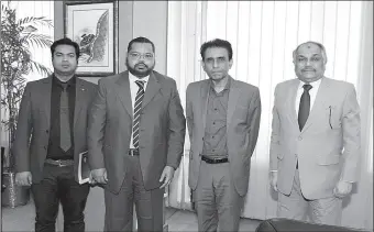  ?? -APP ?? Federal Minister for Informatio­n Technology and Telecommun­ication, Dr. Khalid Maqbool Siddiqui in a group photo during visit to Pak Datacom Ltd head office.