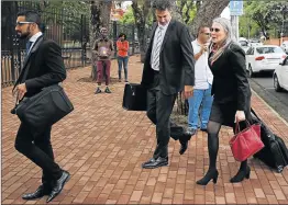  ?? Picture: ALON SKUY ?? IN COURT: Lawyers arrive at the Bloemfonte­in Regional Court yesterday for the bail applicatio­n of eight people arrested during Hawks raids on Gupta properties