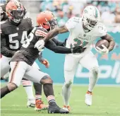  ?? AL DIAZ adiaz@miamiheral­d.com ?? Raheem Mostert rushed for a career-high 891 yards with a 4.9-yard average in his first Dolphins season.