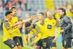  ?? Picture: REUTERS ?? Borussia Dortmund’s Erling Braut Haaland celebrates scoring their third goal with teammates in the game against Mainz 05 in the Bundesliga at Signal Iduna Park, Dortmund, Germany.