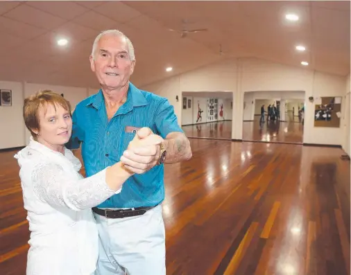  ??  ?? Brenda and Mark Francis enjoy a final dance in the purpose-built ballroom of their Helensvakl­e property, which has gone on the market for $1.275 million.