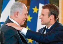  ?? STEPHANE MAHE/EFE ?? No Eliseu. Macron (D) recebe Netanyahu em data histórica