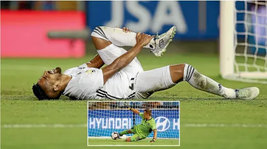  ?? GETTY IMAGES ?? Roy Krishna endured a painful night for the Wellington Phoenix after his 87th-minute penalty was saved by Newcastle Jets goalkeeper Glen Moss, inset. The match ended 1-1.