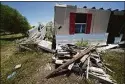  ?? Gerald Herbert / Associated Press ?? A home destroyed by Hurricane Ida in August 2021 is seen on Isle de Jean Charles, La. on May 26.