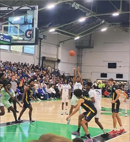  ?? PHOTO COURTESY OF RYAN HARRELL ?? Jaylen Harrell shoots a free throw against national power Montverde last Jan..