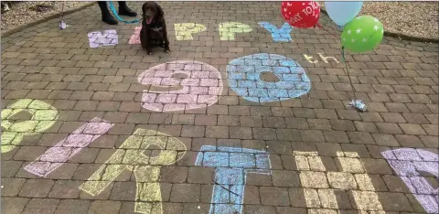  ??  ?? Happy 90th birthday is written on Stanley’s driveway.