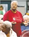  ??  ?? Everlena Holmes, a Glenwood Neighborho­od Associatio­n coordinato­r, speaks during a meeting Tuesday at the Eastgate Senior Center.